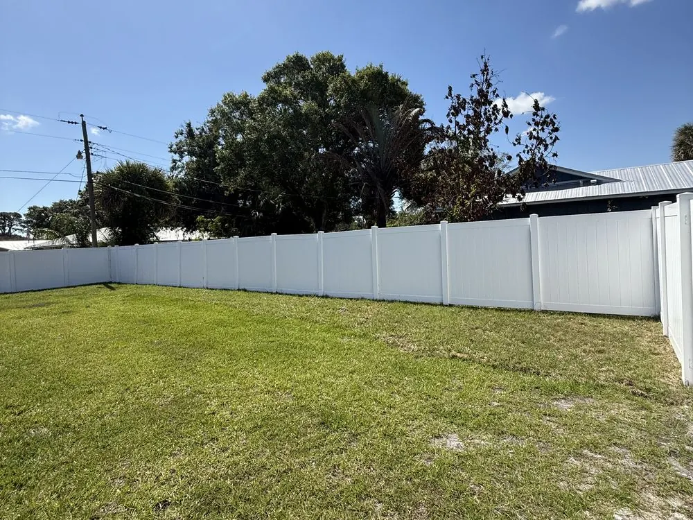 New white vinyl privacy fence install